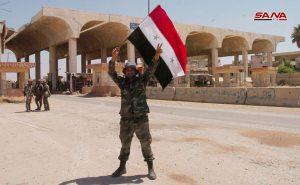 رفع علم سوريا في معبر نصيب الحدودي مع الأردن لأول مرة منذ ثلاث سنوات
